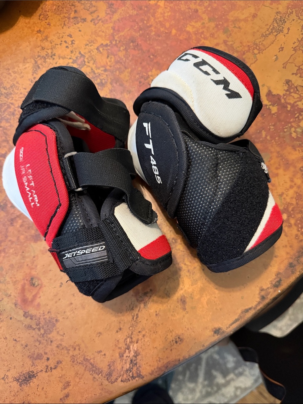 CCM FT485 Junior Small Hockey Elbow Pads in Black, Red, White